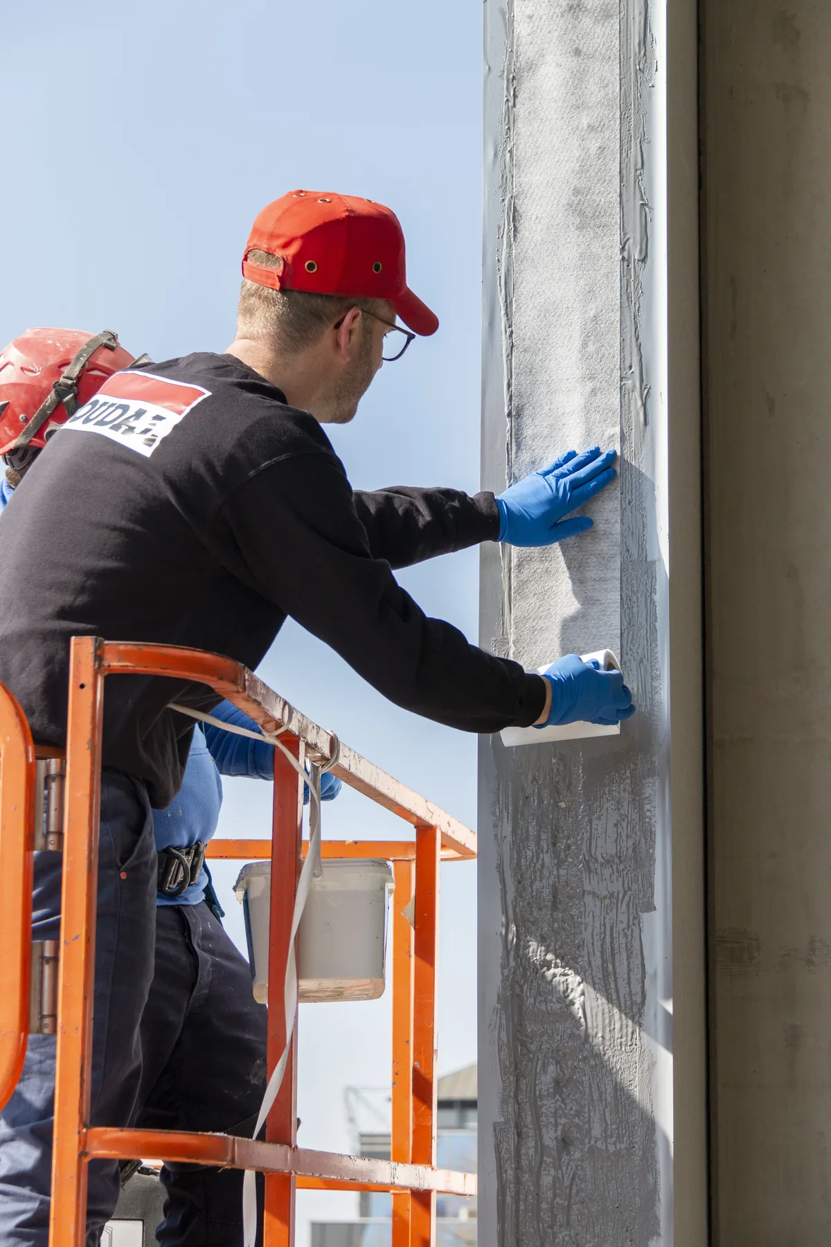 Applying a liquid membrane around an exterior window opening