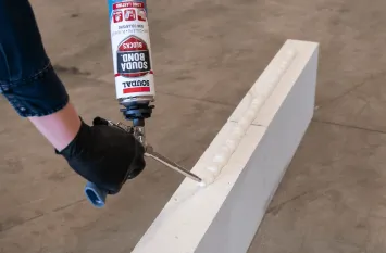 Applying Soudabond Easy to a masonry block