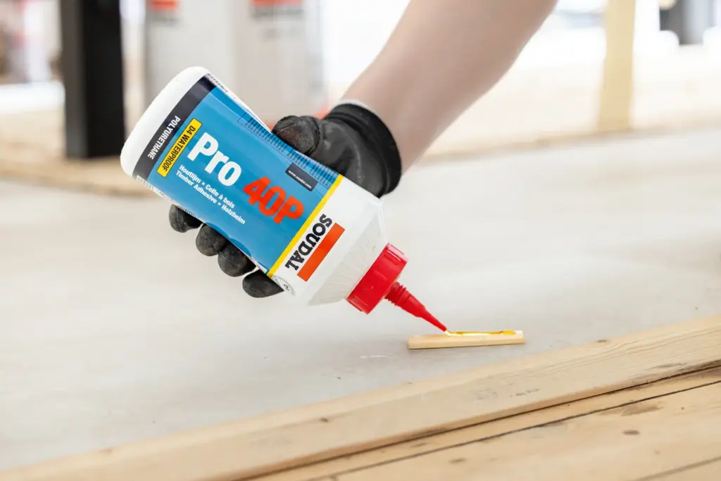 Applying Soudal Pro 40P polyurethane adhesive to timber