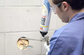Applying Soudabond Easy around a wall service opening
